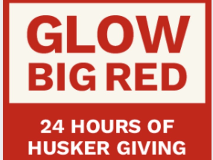 Red and white colored text. Text reads: Glow Big Red, 24 hours of Husker Giving